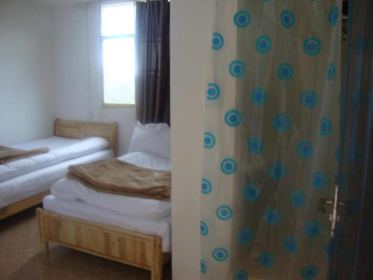 Belinda Backpackers Guesthouse Yuanyang  Rom bilde