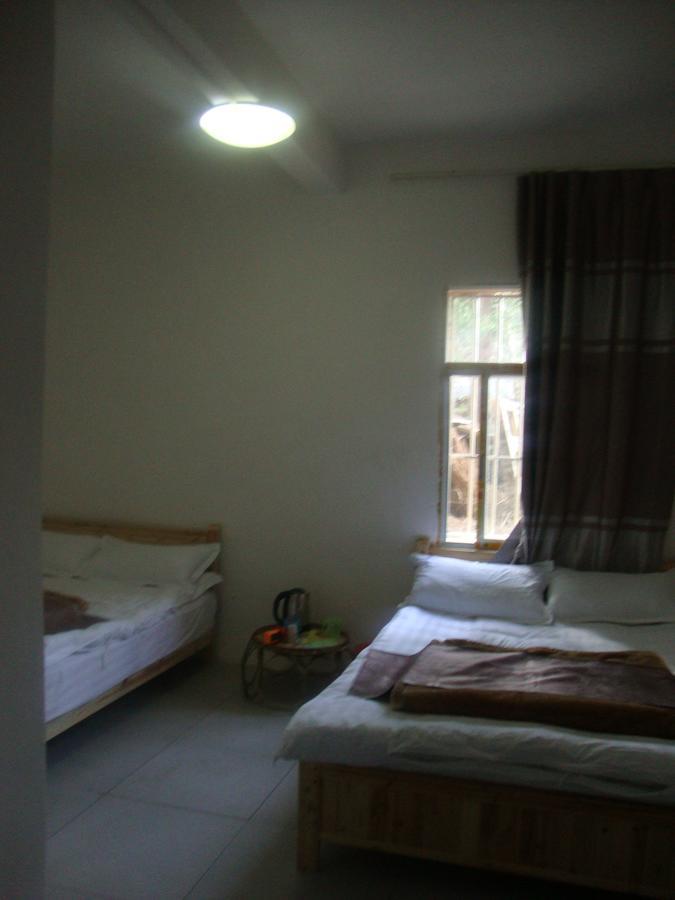Belinda Backpackers Guesthouse Yuanyang  Rom bilde