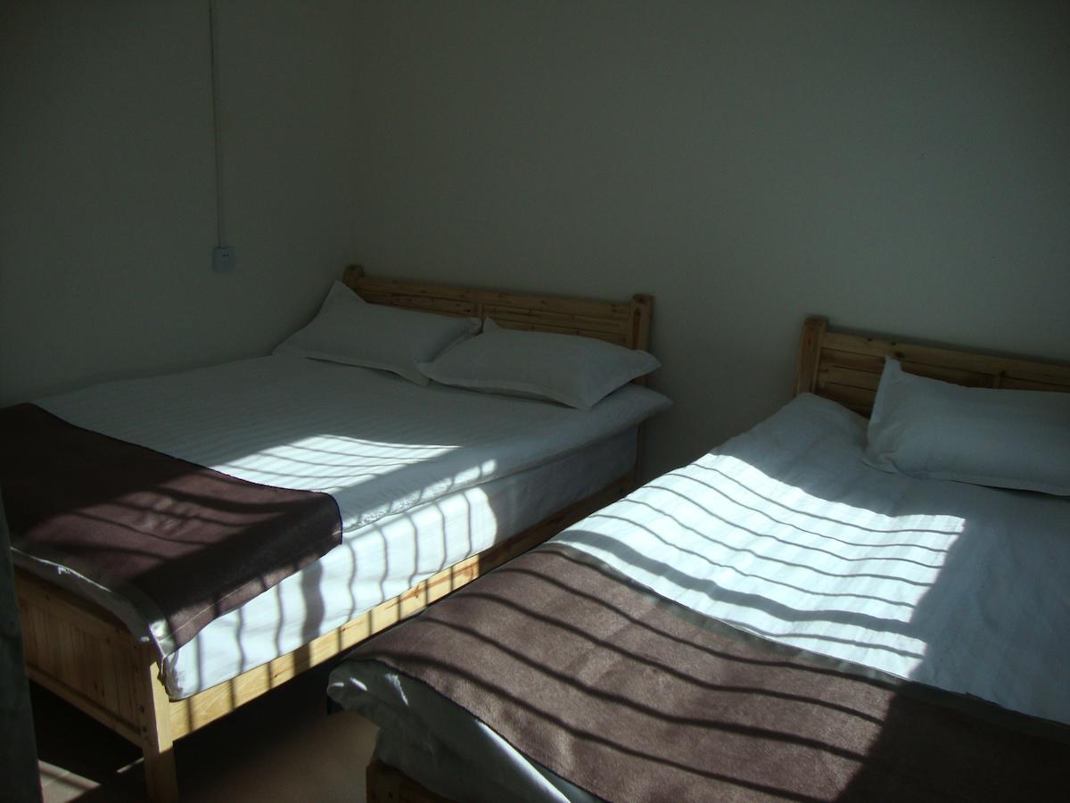 Belinda Backpackers Guesthouse Yuanyang  Rom bilde